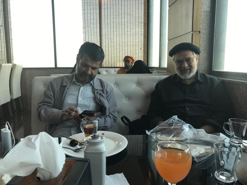 On the Right: Nader Talebzadeh